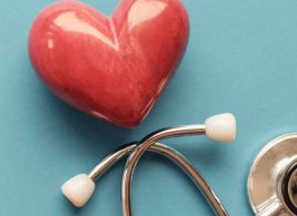 Heart and stethoscope for American Heart Month and Employee Health and Wellness